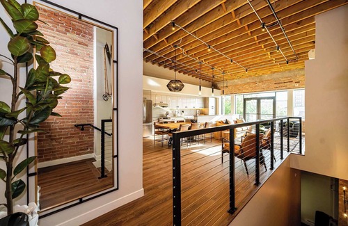 Ogden Apartment | Historic Elegance with Balcony Downtown View