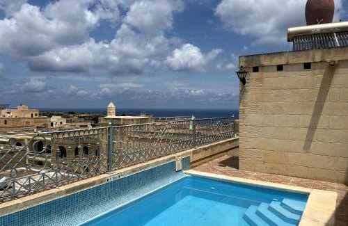 Nadur House | Historic Farmhouse close to San Blass Beach with Courtyard, Kitchen Terrace and Rooftop Pool