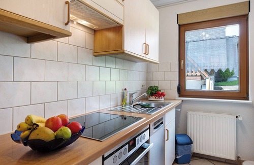 Schollach Apartment | Holiday Apartment 'West' with Shared Terrace, Shared Garden and Balcony