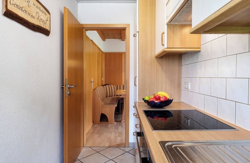 Schollach Apartment | Holiday Apartment 'West' with Shared Terrace, Shared Garden and Balcony