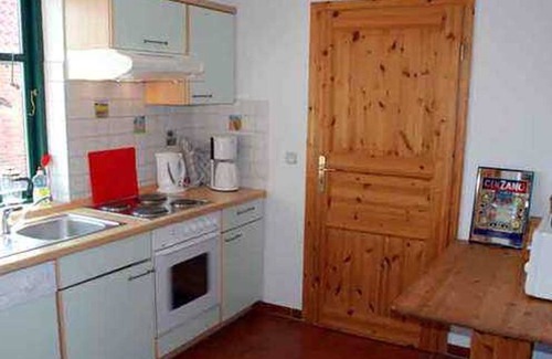Ummanz Apartment | Holiday apartment goose with fireplace - Rügener Ferienhäuser mit Kamin ***