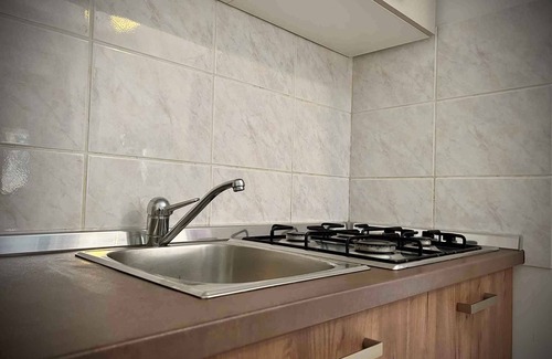 Klimno Apartment | Holiday apartment on the ground floor, with a terrace in Mediterranean greenery and air-conditioned