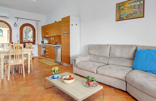 Arzachena Apartment | Holiday Apartment "Residence Le Palme" with Mountain View, Shared Pool & Wi-Fi