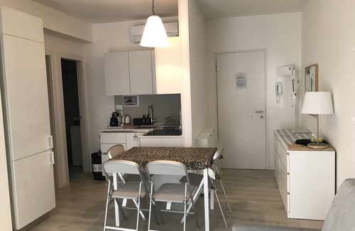 Jesolo Pineta Apartment | Holiday Apartment "Residence Pineta 126" with Shared Pool, Private Terrace & Wi-Fi