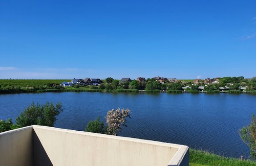 Norderhafen Apartment | Holiday Apartment 'Watt'n Utsicht' with Sea View, Balcony and Wi-Fi
