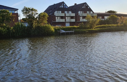 Norderhafen Apartment | Holiday Apartment 'Watt'n Utsicht' with Sea View, Balcony and Wi-Fi