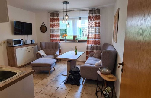 Balve Apartment | Holiday Apartment 'Zum Plauderbaum' with Private Terrace, Private Garden and Private Outdoor Whirlpool