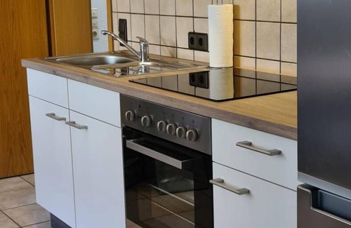 Balve Apartment | Holiday Apartment 'Zum Plauderbaum' with Private Terrace, Private Garden and Private Outdoor Whirlpool