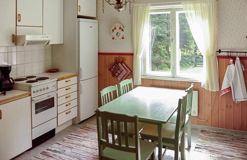 Kimito Island House | Holiday Home Archipelago red cottage by Interhome