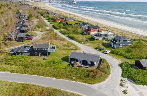 Grena Strand House | Holiday Home Baarde - 60m from the sea by Interhome