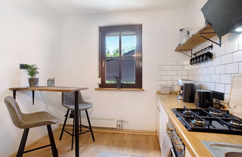 Friedrichshafen House | Holiday Home 'Die Bahnstation' with Private Terrace, Private Garden and Wi-Fi