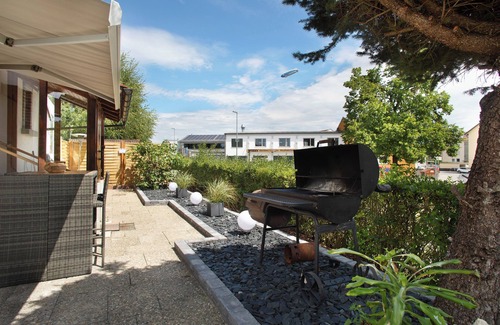 Friedrichshafen House | Holiday Home 'Die Bahnstation' with Private Terrace, Private Garden and Wi-Fi