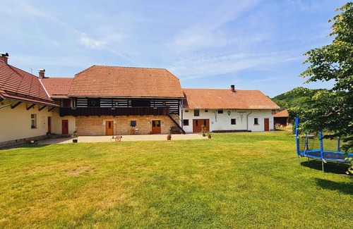 Ostruzno House | Holiday home Half-timbered house (historical homestead) with a sunken indoor pool and wine cellar,