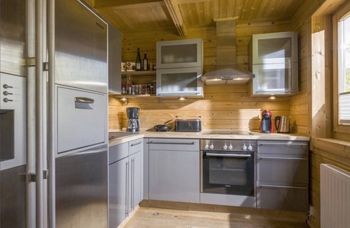 Woergl House | Holiday Home 'Hirschhäusl' with Mountain View, Terrace, Sauna and Wi-Fi