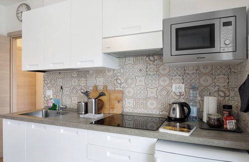 Imperia House | Holiday Home 'Il Gattino Di Porto Appartamento 5' with Shared Pool, Wi-Fi and Air Conditioning