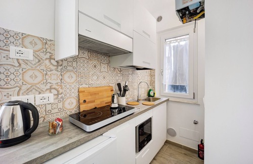 Imperia House | Holiday Home 'Il Gattino Di Porto Appartamento 3' with Shared Pool, Wi-Fi and Air Conditioning