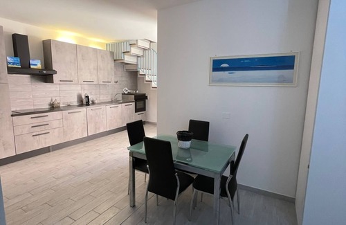 Principina a Mare House | Holiday Home 'Rio Home' with Private Terrace and Air Conditioning
