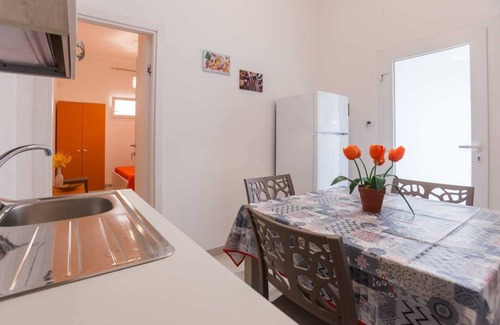 Porto Cesareo House | Holiday Home 'Luna Rossa Salento - Casa Rossa' with Sea View, Jacuzzi & Wi-Fi