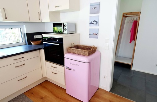 Wasserburg House | Holiday Home 'Moos' with Private Terrace, Shared Garden and Wi-Fi