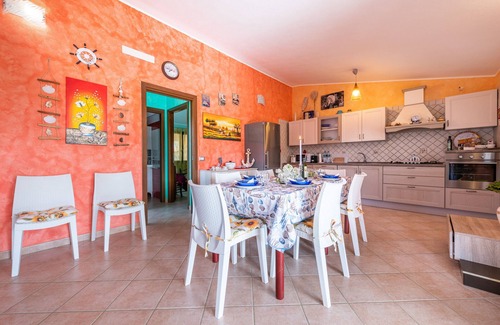Solanas House | Holiday Home 'Villetta Delfino ' with Mountain View, Private Terrace and Private Garden