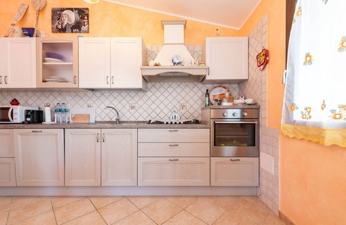 Solanas House | Holiday Home 'Villetta Delfino ' with Mountain View, Private Terrace and Private Garden