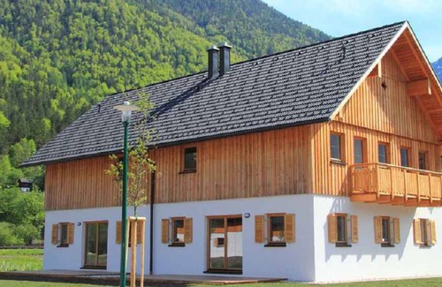 Obertraun House | Holiday home with indoor pool, spa, children's playground and a private sauna in the holiday village