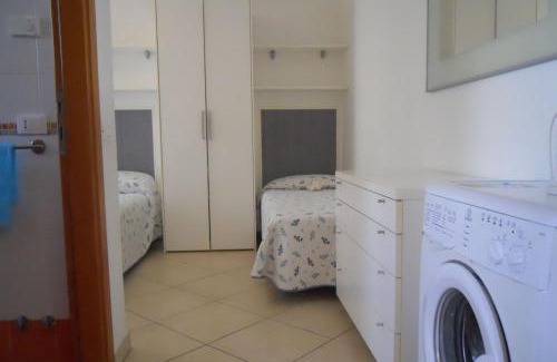 Bibione Lido del Sole Apartment | Holiday village escape with garden and fireplace