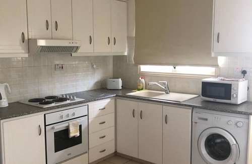Paphos Apartment | HolidayHome-Sleeps4-Poolside-Close Local Amenities