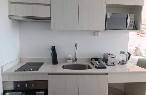 Historical District Apartment | HOM| 1D1B Frente al Mall con Terraza VistaalMar PNM