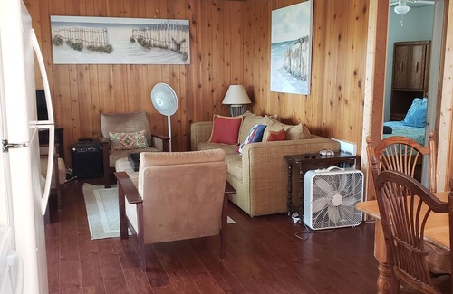 Mears Cottage | Home on the lake. Walk out your door for Swimming, boating or morning coffee.
