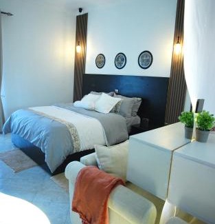 Kampala Apartment | Home2Suite by Veronica Buziga, Munyonyo- Luxury with Netflix, Wi-Fi, & Free Parking