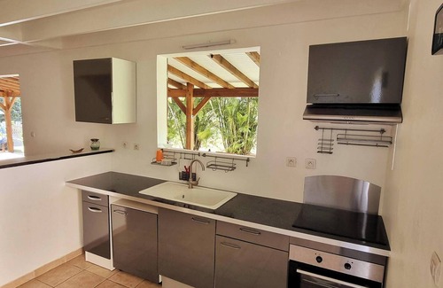 Point d'Or House | Homerez - Cosy house in Les Abymes with relaxing jacuzzi