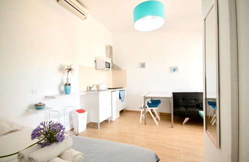 Faro Apartment | Homerez last minute deal - Amazing studio with shared pool