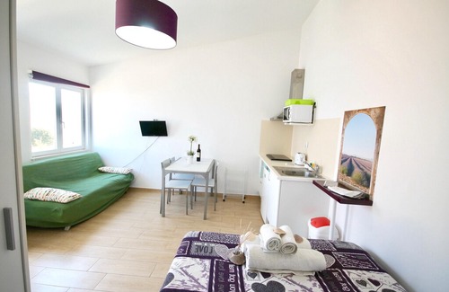 Faro Apartment | Homerez last minute deal - Amazing studio with shared pool