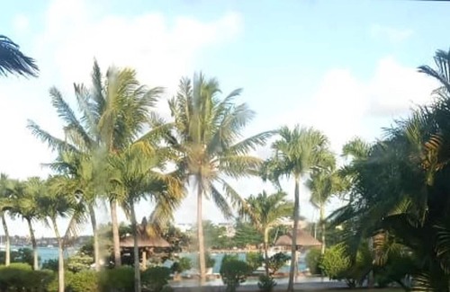 Pointe aux Canonniers Villa | Homerez - Villa for 8 ppl. with shared pool at Pointe aux Cannoniers, Grand Baie