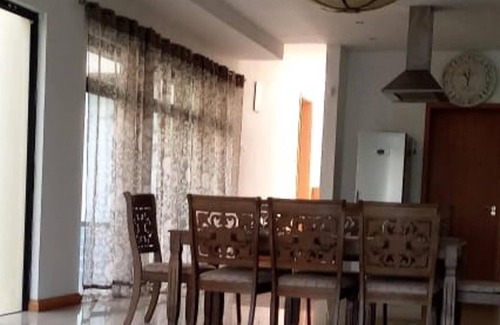 Pointe aux Canonniers Villa | Homerez - Villa for 8 ppl. with shared pool at Pointe aux Cannoniers, Grand Baie