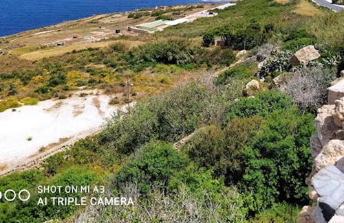 Zebbug Villa | Homerez - Villa for 9 ppl. with swimming-pool, sea view and garden at Iż-Żebbuġ