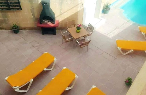 Zebbug Villa | Homerez - Villa for 9 ppl. with swimming-pool, sea view and garden at Iż-Żebbuġ