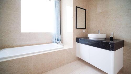 Surabaya Apartment | Homey 3BR with Private Lift at Grand Sungkono Lagoon Apartment By Travelio