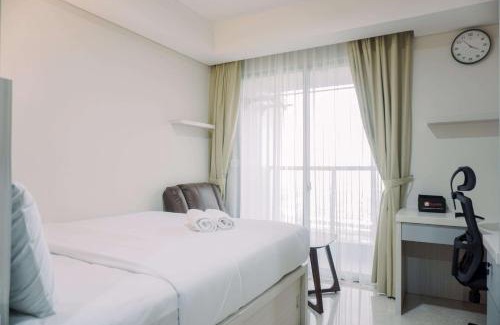 Pantai Indah Kapuk Apartment | Homey and Warm Studio at 28th Floor Gold Coast Apartment By Travelio