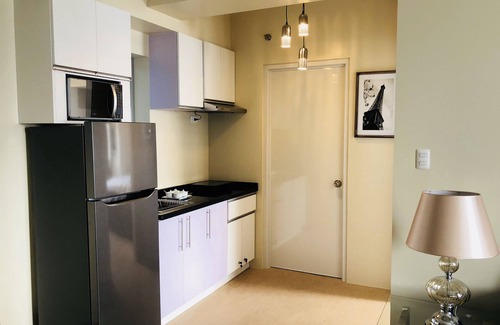 Barangay 32 Condo | Homey Comfy CondoTel - AVIDA