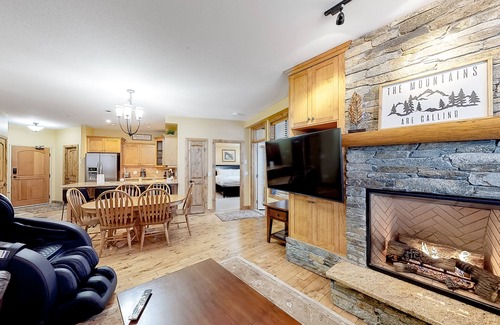 Big White Ski Resort Condo | Homey ski-in/out condo with private hot tub & entertainment