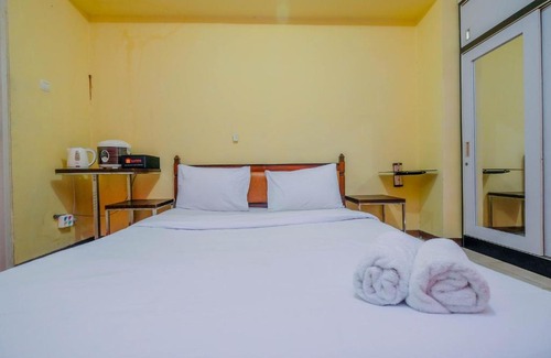 Bogor Apartment | Homey Studio Apartment with Pool View at Bogor Valley By Travelio