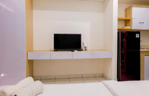 Pagedangan Apartment | Homey Studio at Casa De Parco Apartment By Travelio