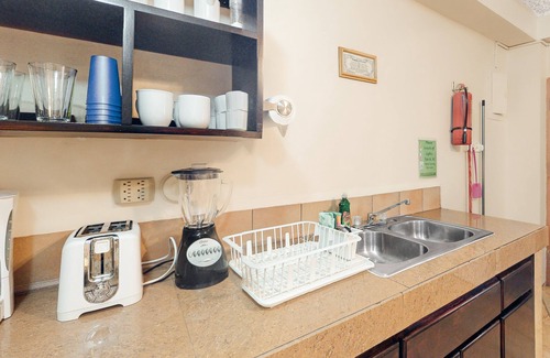San Pedro House | Homey suite in town w/WiFi, partial AC, shared pool & veranda - walk to beach