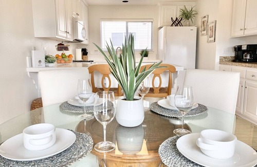 Downtown Condo | Host By Owner! Family Size Condo! Walk to the Beach & Downtown! Two-car garage!