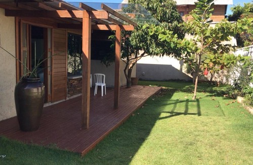 Rio Vermelho Sul House | House next to the woods, beach and lagoon.