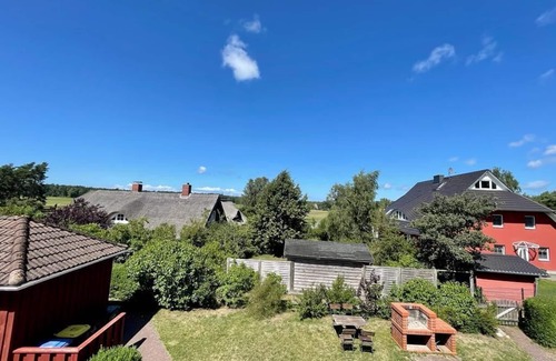 Wieck auf dem Darss Apartment | House in a house idyllically quiet in the middle of the village on a large sunny garden plot