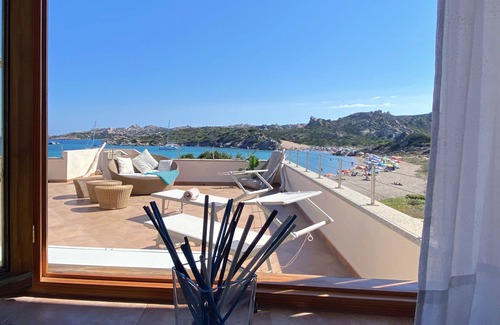 La Maddalena Apartment | House on the beach of Monti d'à Rena with terrace, garden and wi-fi connection