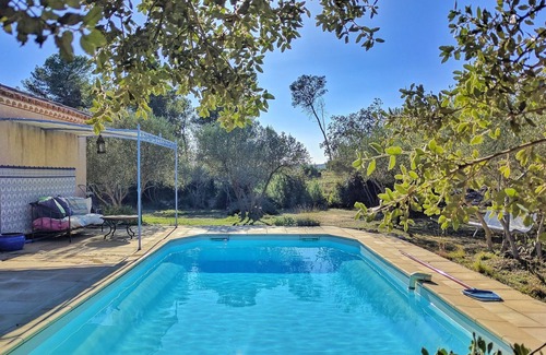 Saint-Bauzille-de-Montmel Villa | House view over cliff and olivette